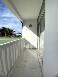 Balkon lub taras w obiekcie Apt T1,bien situé Anse Mitan Trois Ilets