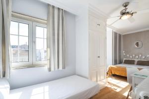 Кровать или кровати в номере Hotel Alda Puerta Del Sol