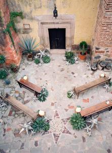 a model of a courtyard with a fireplace at Hacienda El Carmen Hotel & Spa in Portes Gil +89 photos
