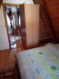 Postel nebo postele na pokoji v ubytování Planinska Kuća Dušan