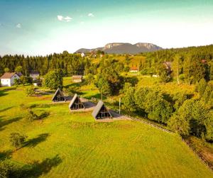 an aerial view of a house on a green field at MANGATA in Pale