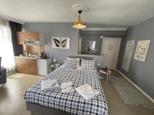 Postel nebo postele na pokoji v ubytování Flats Company - Karakoy Apartment