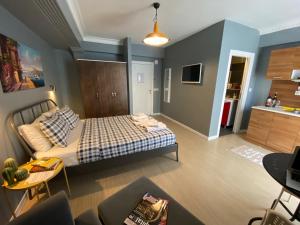 Postel nebo postele na pokoji v ubytování Flats Company - Karakoy Apartment