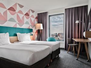 Posteľ alebo postele v izbe v ubytovaní Holiday Inn - Warsaw City Centre by IHG