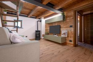 TV a/nebo společenská místnost v ubytování Maison Marcoz - Appartamenti vacanze