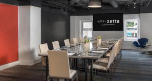 a long dining room with a long table and chairs at Hotel Zetta San Francisco in San Francisco