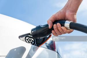 a hand is holding a car drier at Hotel Les Restanques De Moustiers in Moustiers-Sainte-Marie