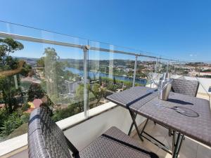 En balkon eller terrasse på FeelCoimbra Mondego Views