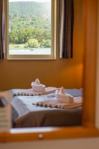 Aquamarina Hotel Visegrád客房内的一张或多张床位