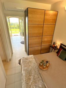 Postel nebo postele na pokoji v ubytování Just Langhe Casa Dolcetto