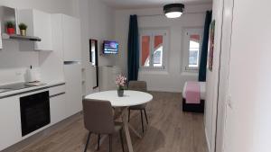 Η κουζίνα ή μικρή κουζίνα στο Vigarani Apartments