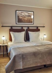 Postel nebo postele na pokoji v ubytování Arbio I Makro Apartments