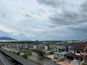 a view of a town with houses and a road at P3 Great value, cozy, convenient in city! in Kuching