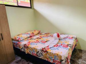 Letto o letti in una camera di Casita Colorada, Sierpe de Osa