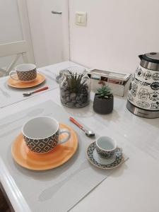 Příslušenství pro přípravu čaje a kávy v ubytování Locazione turistica LA CASETTA