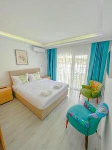 Postel nebo postele na pokoji v ubytování Mercan Otel