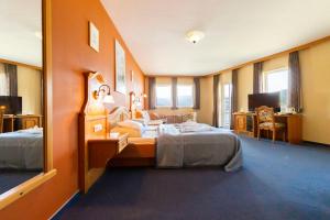 Aquamarina Hotel Visegrád客房内的一张或多张床位