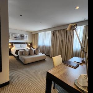Postel nebo postele na pokoji v ubytování Hotel Los Españoles Plus