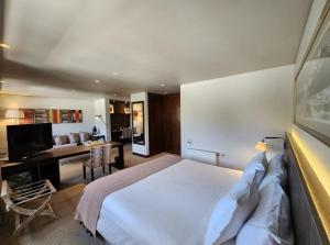 Postel nebo postele na pokoji v ubytování Hotel Los Españoles Plus