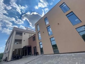 a building with the sky in the background at Hotel Konstantin in Pristina