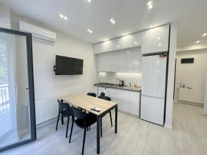 Kuchnia lub aneks kuchenny w obiekcie GSS - 5 Apartment