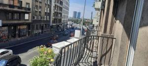 a view from a balcony of a city street with cars at The Bridgeview Suite in Belgrade