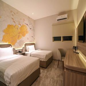 Yulia Hotel Managed by HIG客房内的一张或多张床位