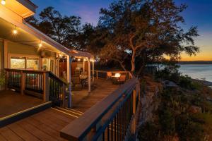 a porch of a house with a view of the water at BoGi in Canyon Lake