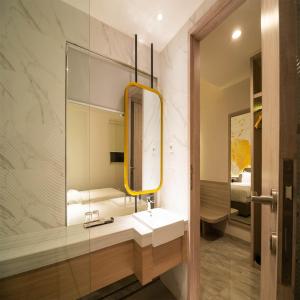 Yulia Hotel Managed by HIG客房内的一张或多张床位