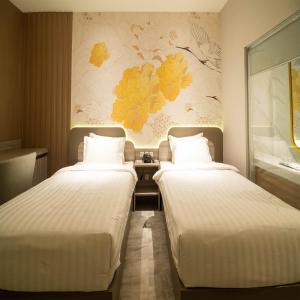 Yulia Hotel Managed by HIG客房内的一张或多张床位