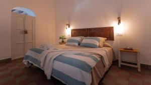 Un ou plusieurs lits dans un hébergement de l'établissement La Casita Beneroso 28 autres photos