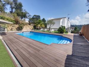 The swimming pool at or close to Bright Villa in Vidreres with Private Pool and Jacuzzi