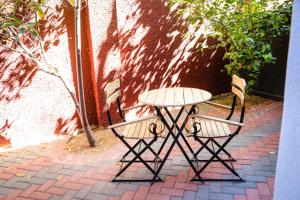 Windhoek şehrindeki Windhoek Gardens Boutique Hotel tesisine ait fotoğraf galerisinden bir görsel