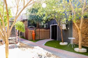 Windhoek Gardens Boutique Hotel tesisinin dışında bir bahçe