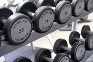a bunch of dumbbells on display in a gym at Park Plaza London Victoria in London