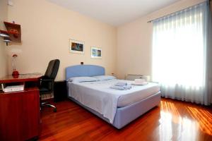 Postel nebo postele na pokoji v ubytování 5* Seaview Villa Clara for 12+ guests, Kožino