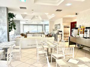 A restaurant or other place to eat at Hotel Alemagna Bed&Breakfast Bibione Lido del Sole