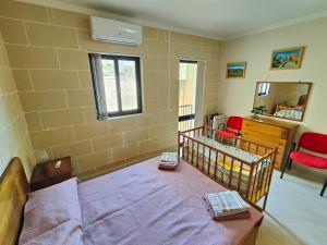 Seaview Apartment客房内的一张或多张床位