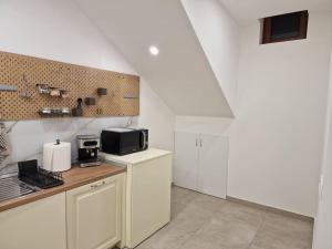 Kuhinja oz. manjša kuhinja v nastanitvi Apartma Na razgledni poti