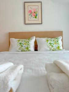 Postel nebo postele na pokoji v ubytování Mercan Otel