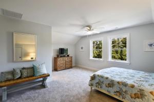 Postel nebo postele na pokoji v ubytování Ghost Crab Cottage + 22 fotografií