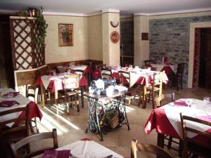 Un restaurant sau alt loc unde se poate mânca la Locanda Aquila Bianca