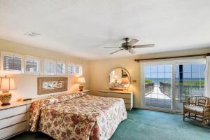 Ένα ή περισσότερα κρεβάτια σε δωμάτιο στο The Topan at Ships Watch