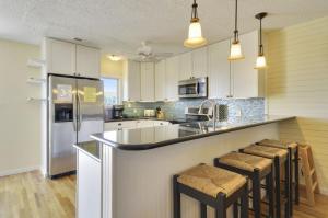 Kuchyň nebo kuchyňský kout v ubytování Wish You Were Here