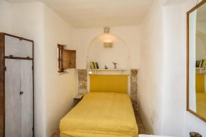 Postel nebo postele na pokoji v ubytování B&b Cinque Stalle