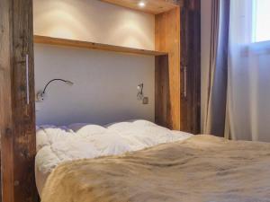 Appartement Méribel, 4 pièces, 5 personnes - FR-1-182-166にあるベッド