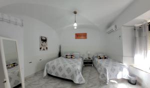 A bed or beds in a room at CASA VASCO