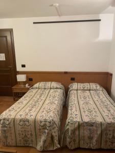 Postel nebo postele na pokoji v ubytování Villa Felcaro - Relais, Lodge & Restaurant