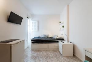 Μια τηλεόραση ή/και κέντρο ψυχαγωγίας στο Las Palmas Central Rooms