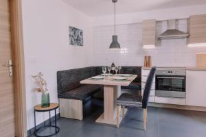 Kuchyň nebo kuchyňský kout v ubytování Apartment Walter
